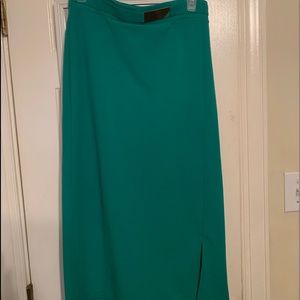 Green pencil skirt with silver belt attached
